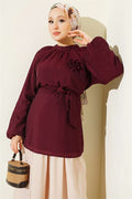 Burgundy Tunic with Rose Brooch and Belted Waist