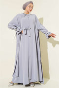 Gray Dress with Pearl Embellishments and Butterfly Cape