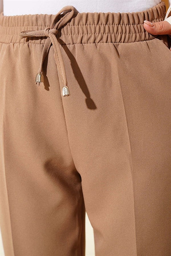 Beige Slim-Fit Trousers with Drawstring Detail and Elastic Waistband