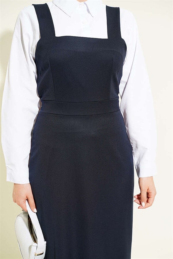 Thick-strapped, ruffled pinafore dress, navy blue.