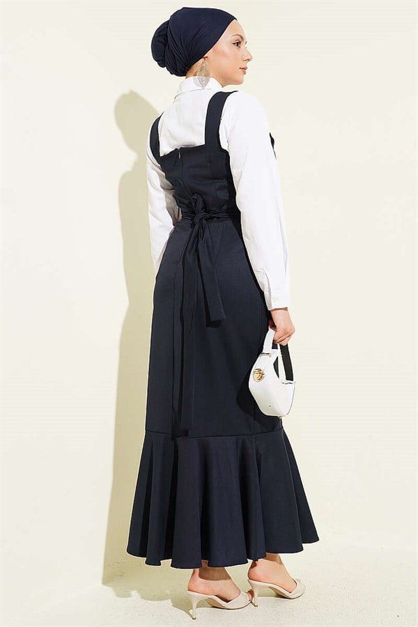 Thick-strapped, ruffled pinafore dress, navy blue.