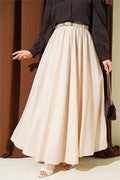 Cream-colored voile skirt with elastic waistband.