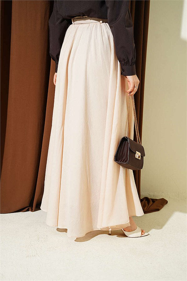 Cream-colored voile skirt with elastic waistband.