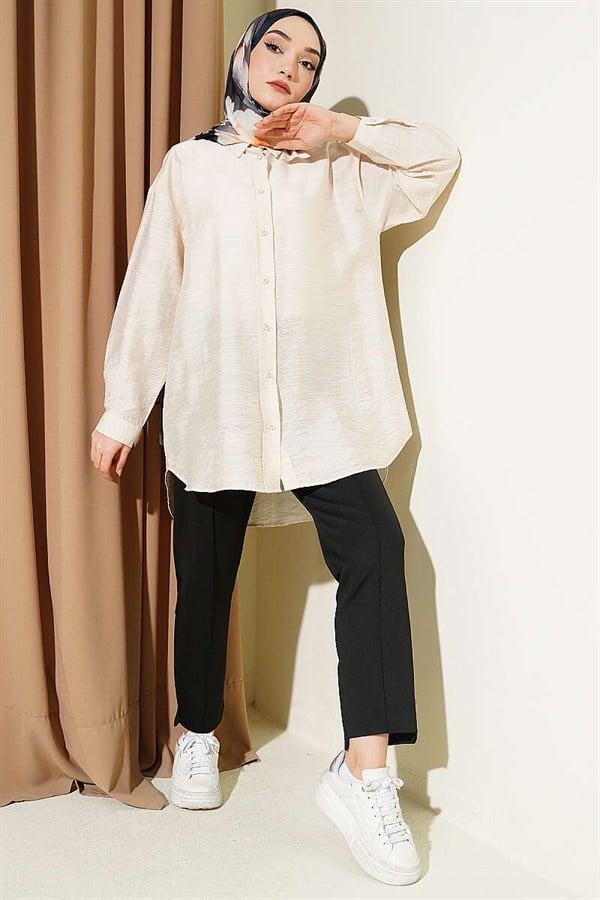 Self-patterned floral shirt in stone.