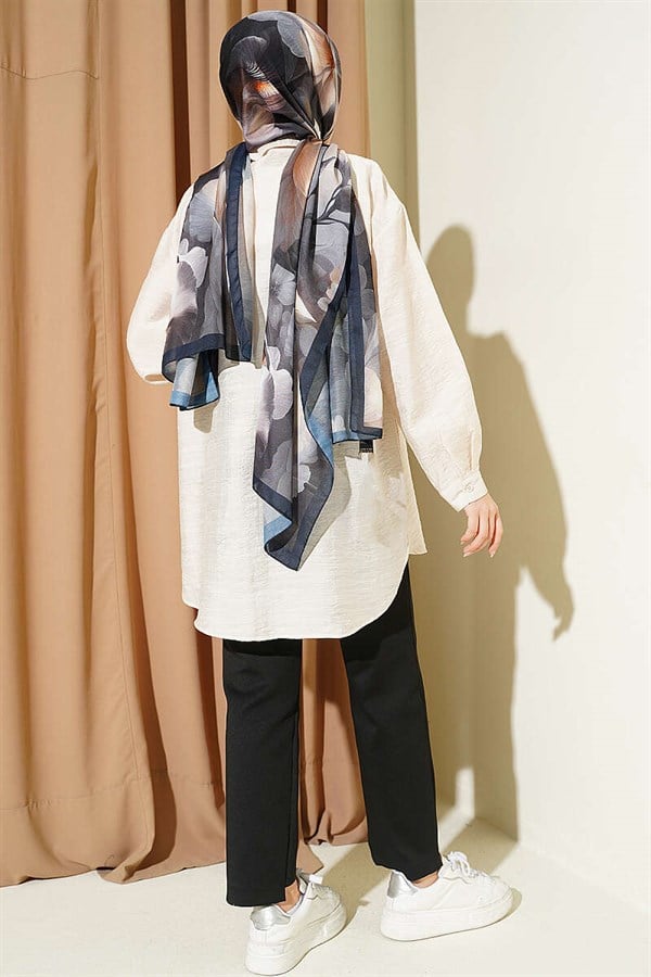 Self-patterned floral shirt in stone.
