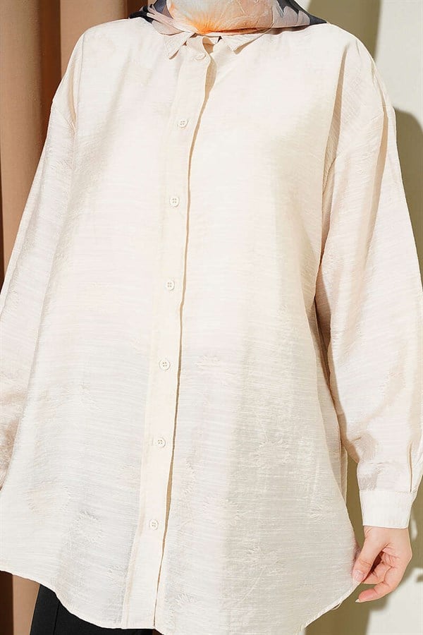 Self-patterned floral shirt in stone.