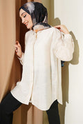 Self-patterned floral shirt in stone.