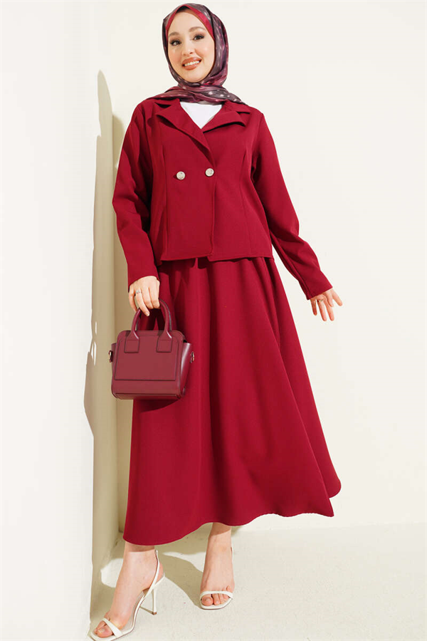 Double-breasted jacket and skirt suit in burgundy.