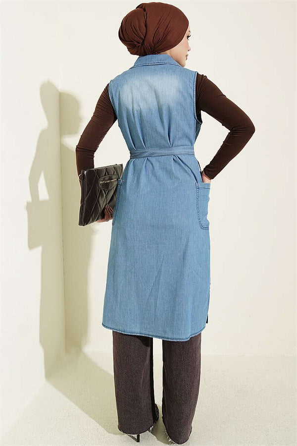 Double-breasted vest with pockets, light blue.