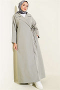 Double-breasted trench coat with drawstring closure, grey.