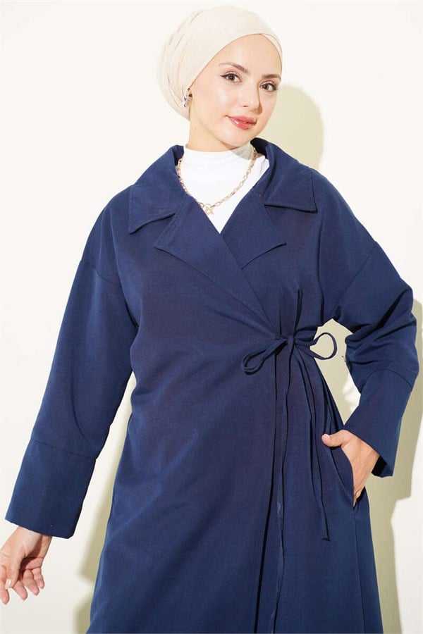 Double-breasted trench coat with drawstring closure, navy blue.