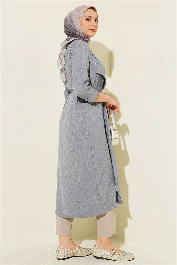 Double-breasted coat with drawstring detail in grey.