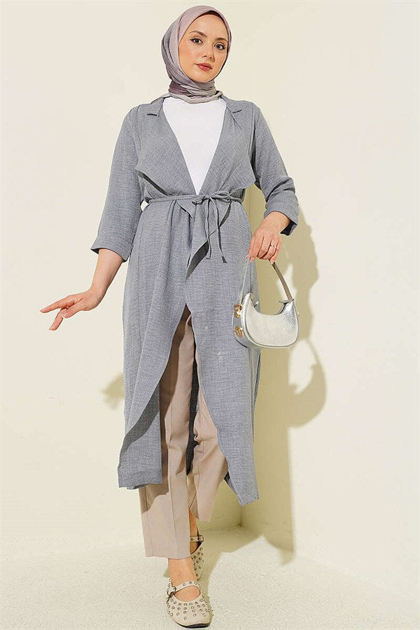 Double-breasted coat with drawstring detail in grey.