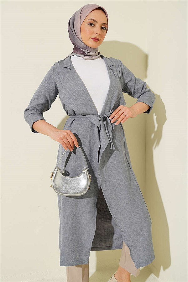 Double-breasted coat with drawstring detail in grey.