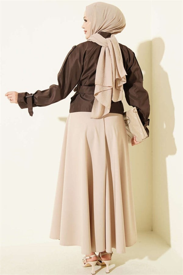 Double-breasted belted short trench coat in brown.