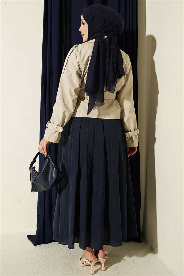 Double-breasted belted short trench coat in stone.