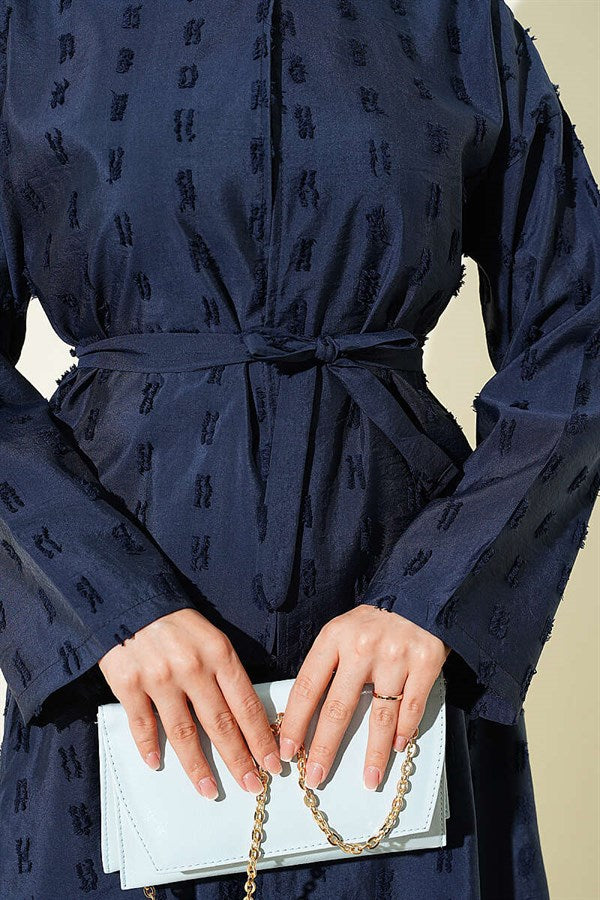 2 Piece Set with mini skirt and tassel detail, navy blue.