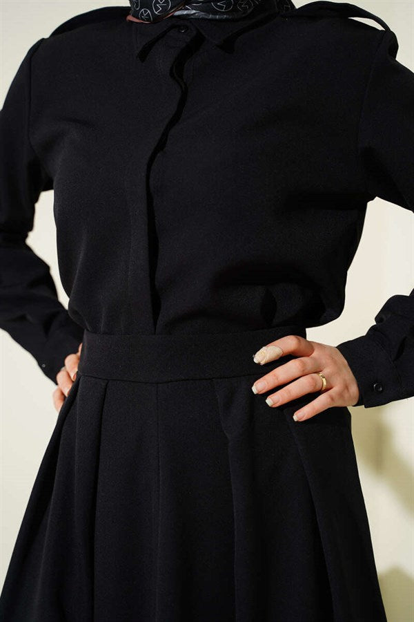 2 Piece Set with pleated skirt and shoulder epaulets, black.