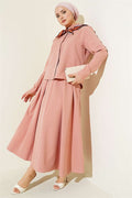 2 Piece Set with pleated skirt and shoulder epaulets, powder pink.