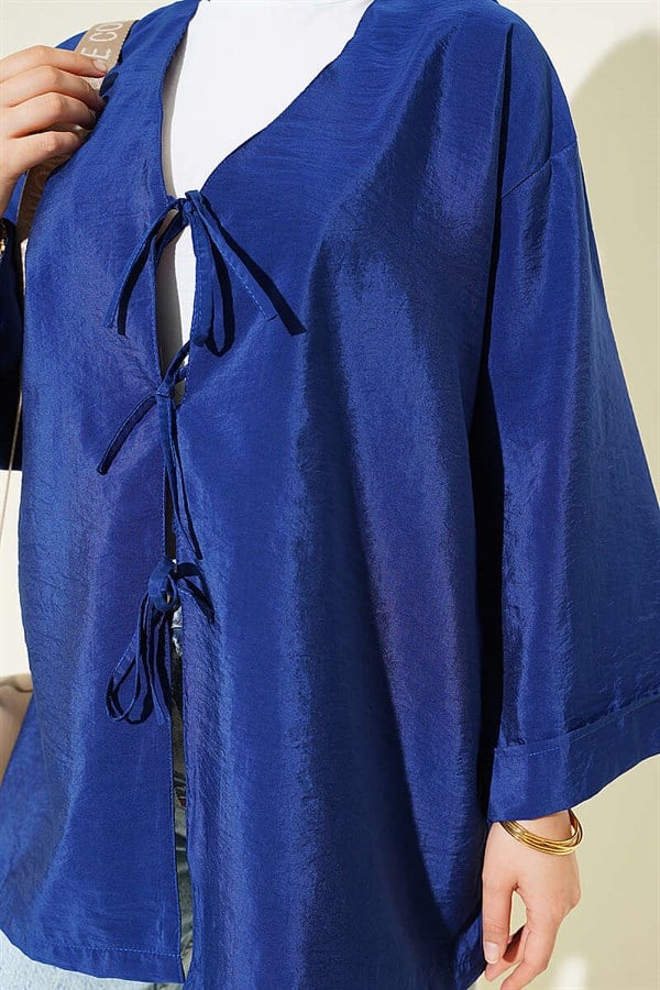 Loose-fitting parachute kimono with front tie closure, navy blue.