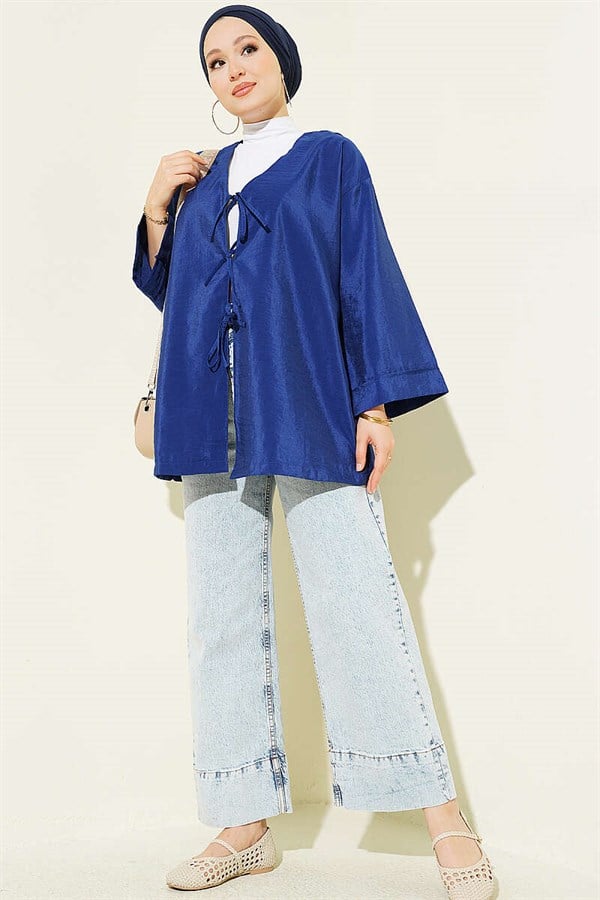 Loose-fitting parachute kimono with front tie closure, navy blue.