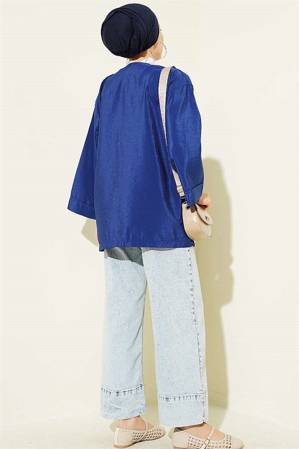 Loose-fitting parachute kimono with front tie closure, navy blue.