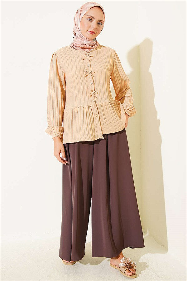 Button-down shirt with bow detail at the front, beige.