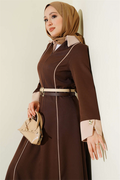 Coffee-colored dress with concealed front zipper and double belts.