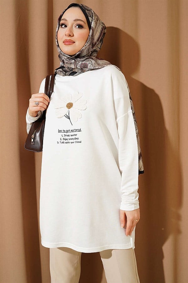 White Tunic with Daisy Emblem on Front