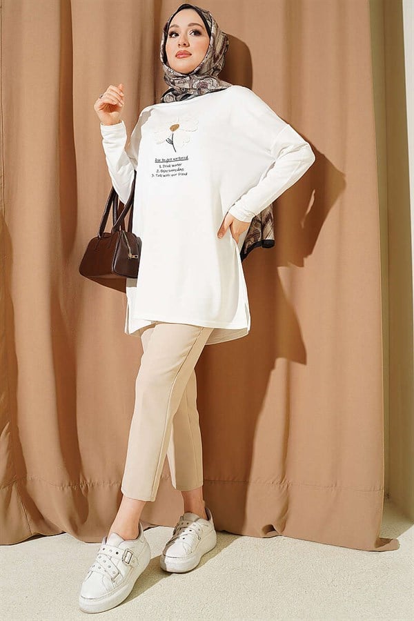 White Tunic with Daisy Emblem on Front
