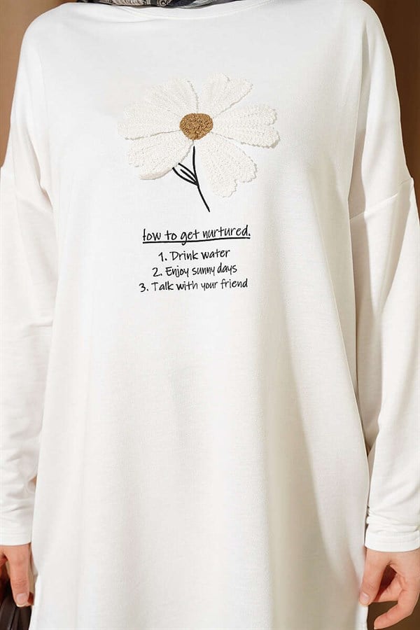White Tunic with Daisy Emblem on Front
