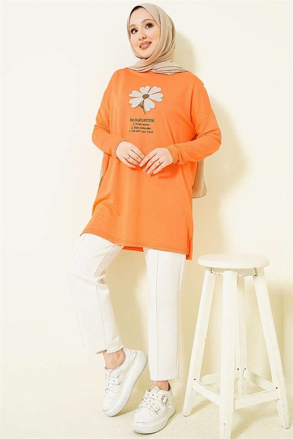 Orange Tunic with Daisy Emblem on Front