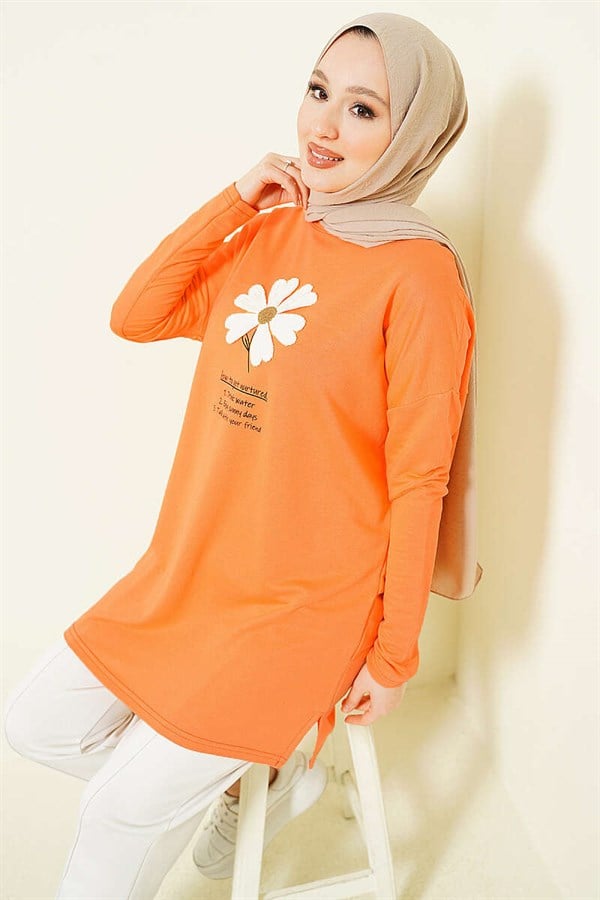 Orange Tunic with Daisy Emblem on Front