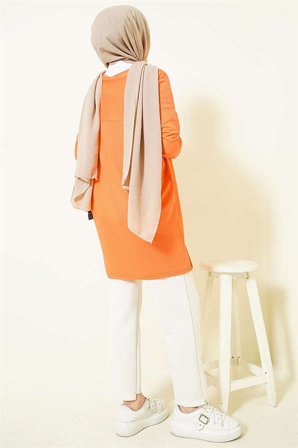 Orange Tunic with Daisy Emblem on Front