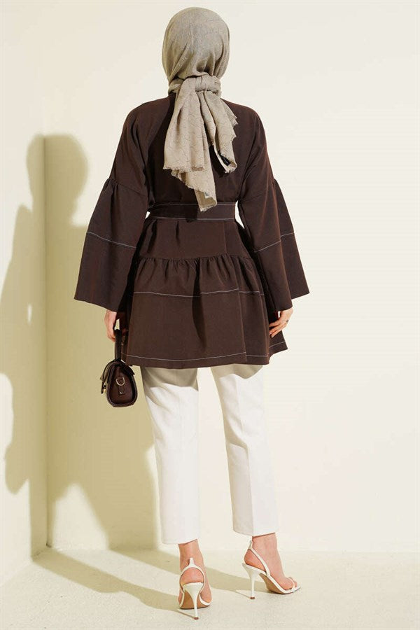 Stone-embellished hidden button tunic in brown.