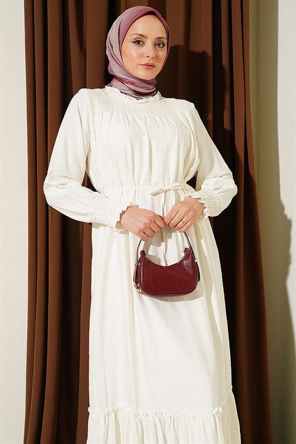 Ecru Ruffled Dress with G-Length and Embellishments at the Front and Ankles