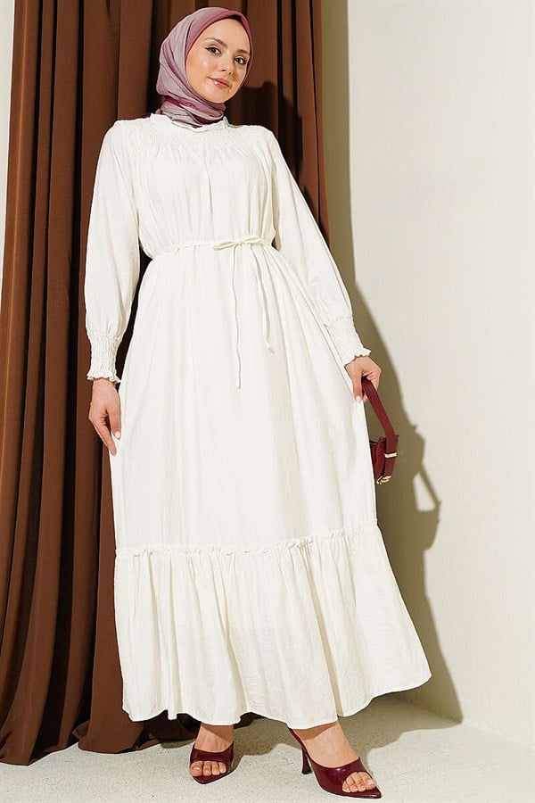 Ecru Ruffled Dress with G-Length and Embellishments at the Front and Ankles