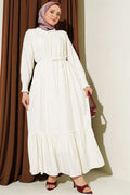 Ecru Ruffled Dress with G-Length and Embellishments at the Front and Ankles