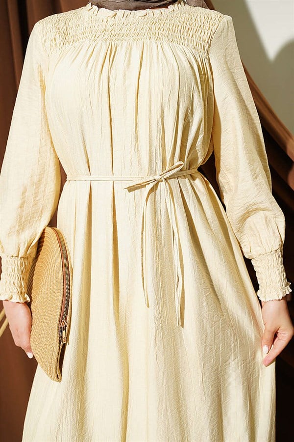 Sand Beige Ruffled Dress with G-Length and Embellishments at the Front and Ankles