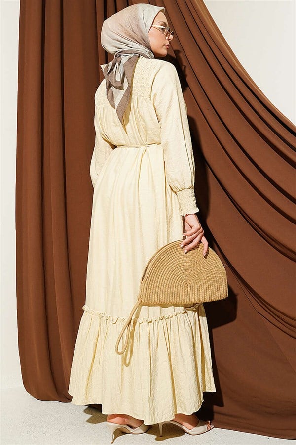 Sand Beige Ruffled Dress with G-Length and Embellishments at the Front and Ankles