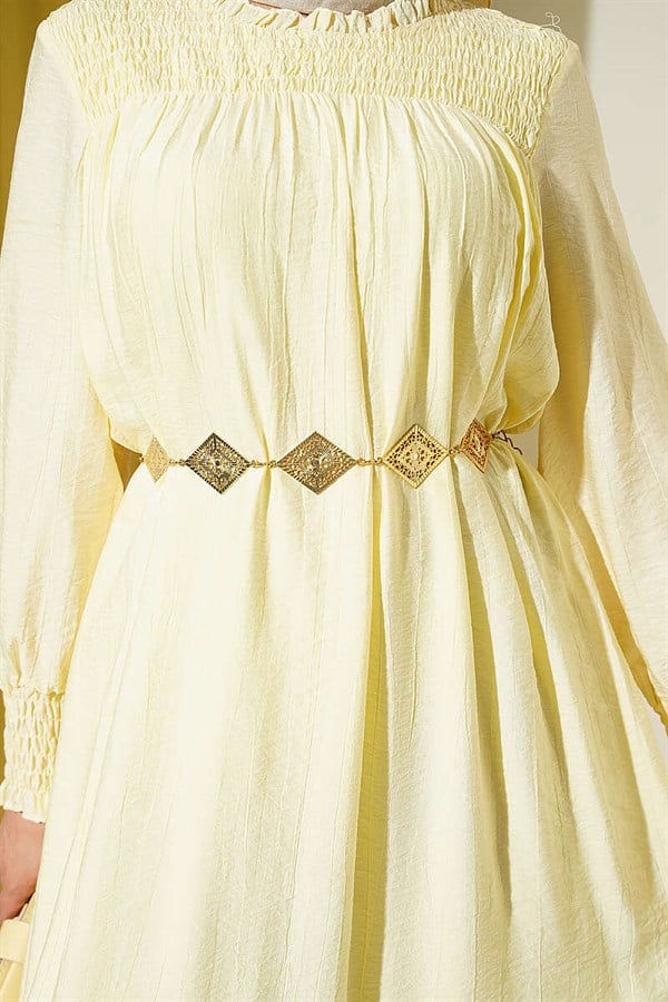 Yellow Ruffled Dress with G-Length and Embellishments at the Front and Ankles