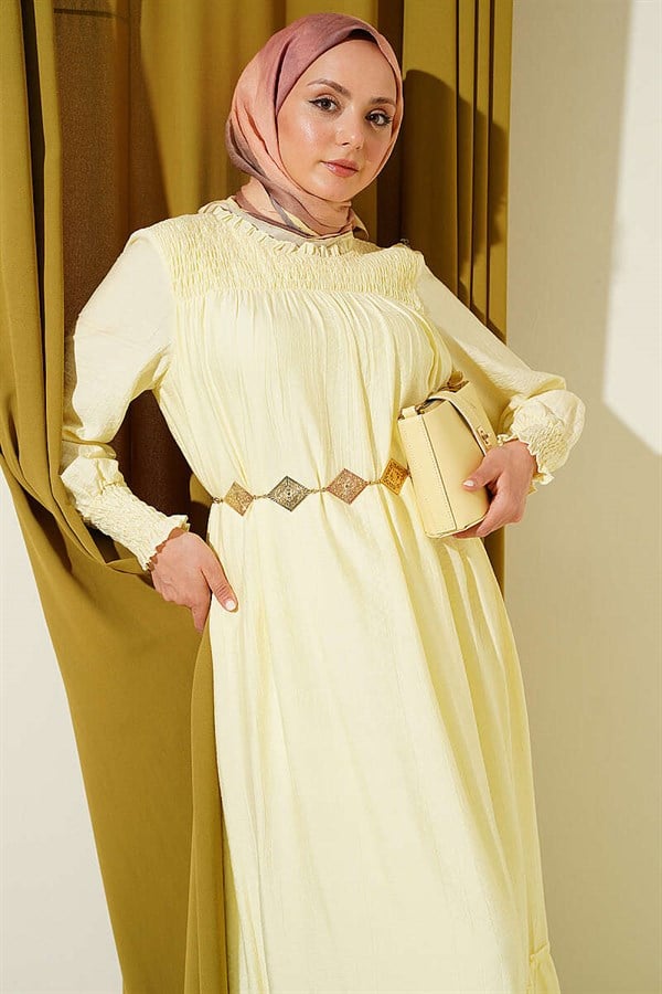 Yellow Ruffled Dress with G-Length and Embellishments at the Front and Ankles