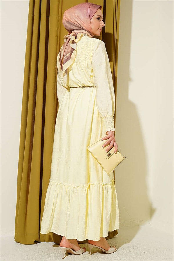 Yellow Ruffled Dress with G-Length and Embellishments at the Front and Ankles
