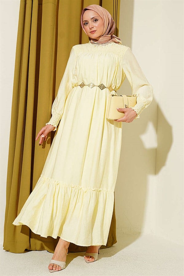 Yellow Ruffled Dress with G-Length and Embellishments at the Front and Ankles