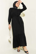 Black Ruffled Dress with G-Length and Embellishments at the Front and Ankles