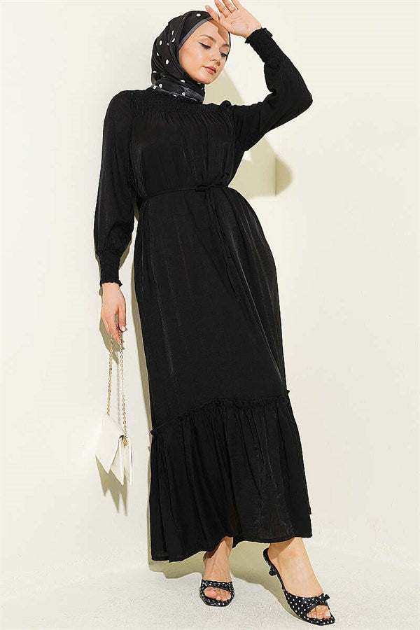 Black Ruffled Dress with G-Length and Embellishments at the Front and Ankles
