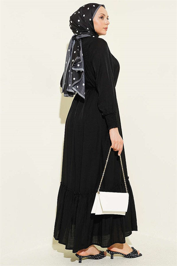 Black Ruffled Dress with G-Length and Embellishments at the Front and Ankles