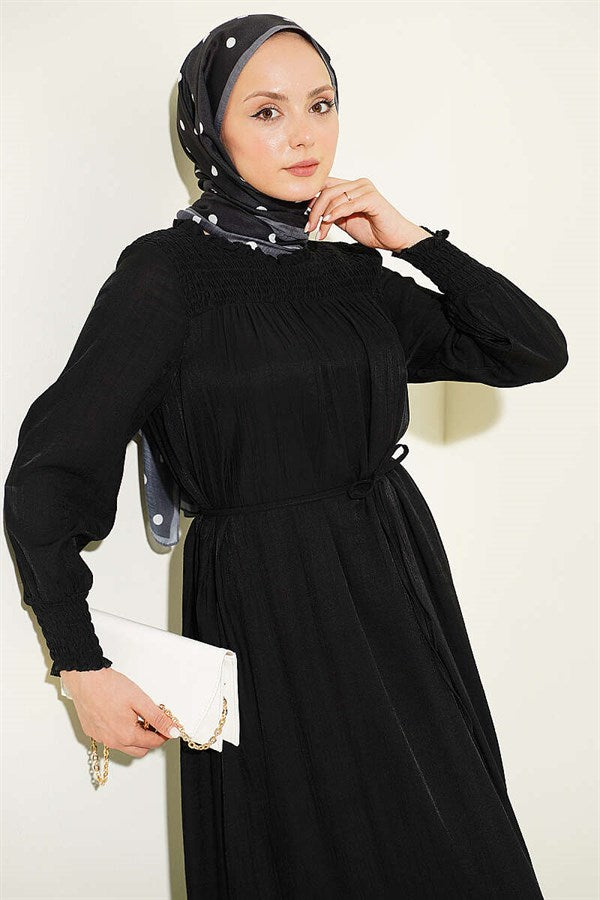 Black Ruffled Dress with G-Length and Embellishments at the Front and Ankles