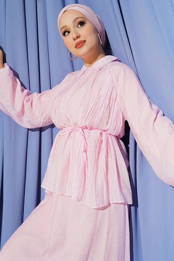 2 Piece Set with pleated, tie-tie skirt in pink.