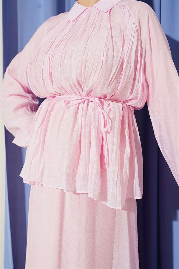 2 Piece Set with pleated, tie-tie skirt in pink.